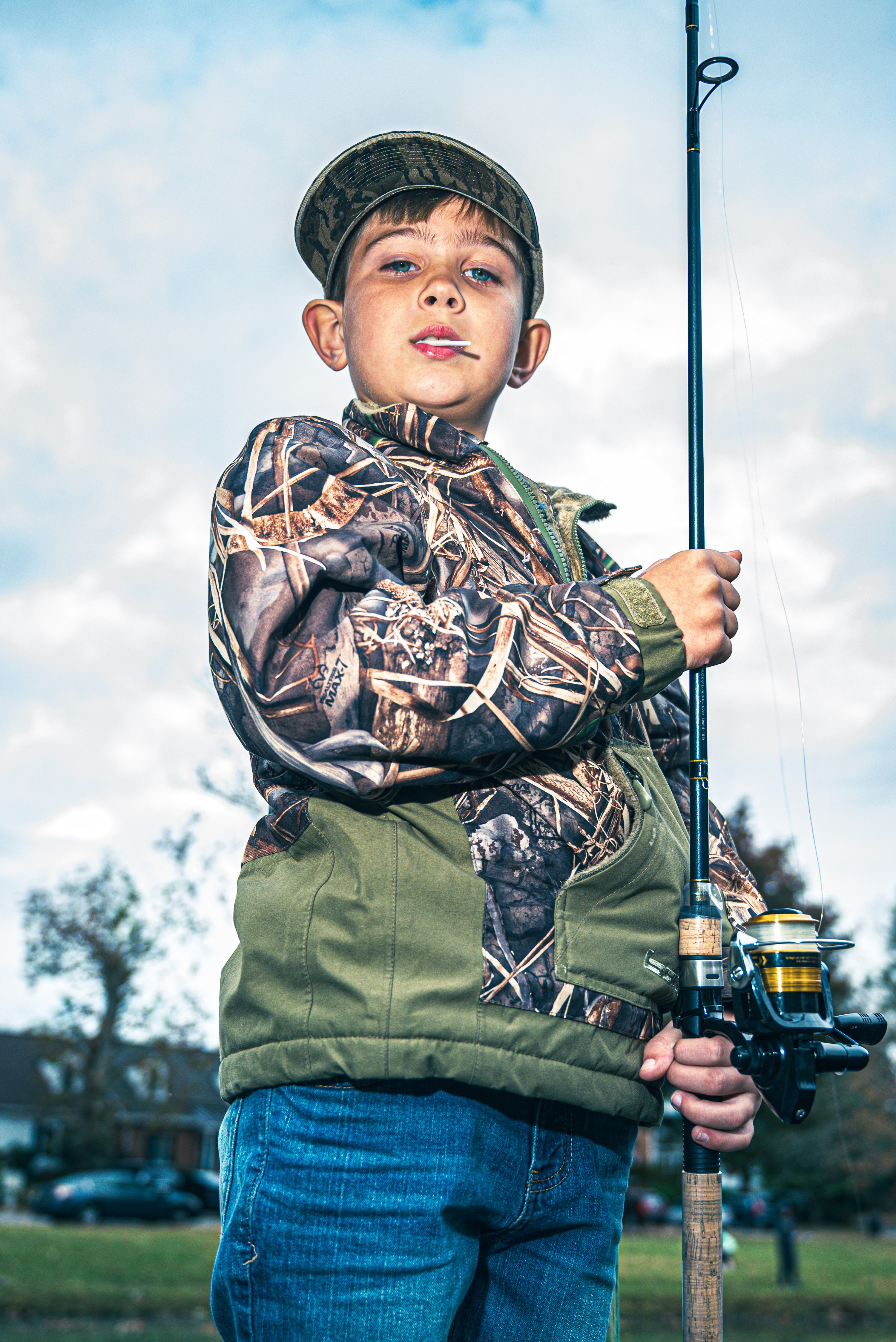 A young boy looks into the camera for a portrait.